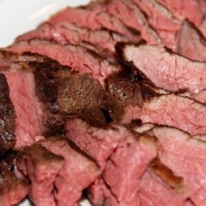 A plate of paleo and Whole30 sous vide grass fed tri-tip roast sliced up.