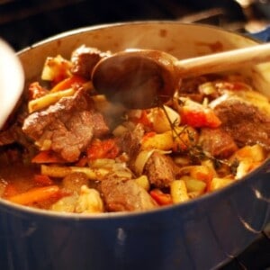 Oven-braised beef stew in a Dutch oven.
