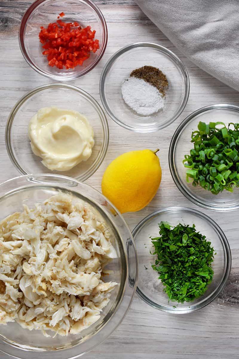 An overhead shot of the ingredients for simple crab salad