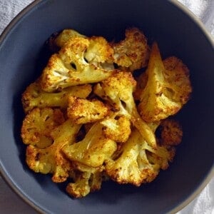 An overhead shot of a bowl of Roasted Curried Cauliflower
