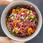 Overhead shot of Whole30 and paleo red cabbage slaw with tangy carrot and ginger dressing