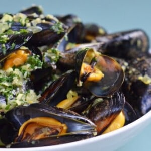 A bowl of thai steamed mussels.