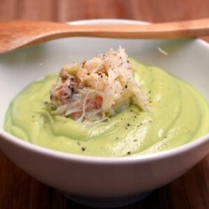 Bowl of chilled cream of avocado soup with dungeness crab