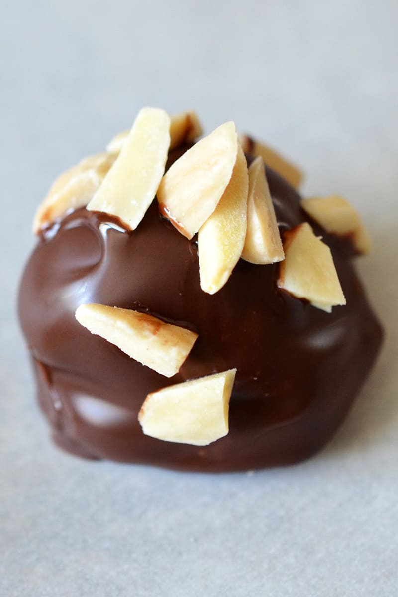 A closeup shot of a Chunky Monkey Ice Cream Bon Bon, a healthy paleo dessert.