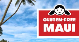 A beautiful beach with palm trees in Maui. There is a red banner that reads Gluten-Free Maui