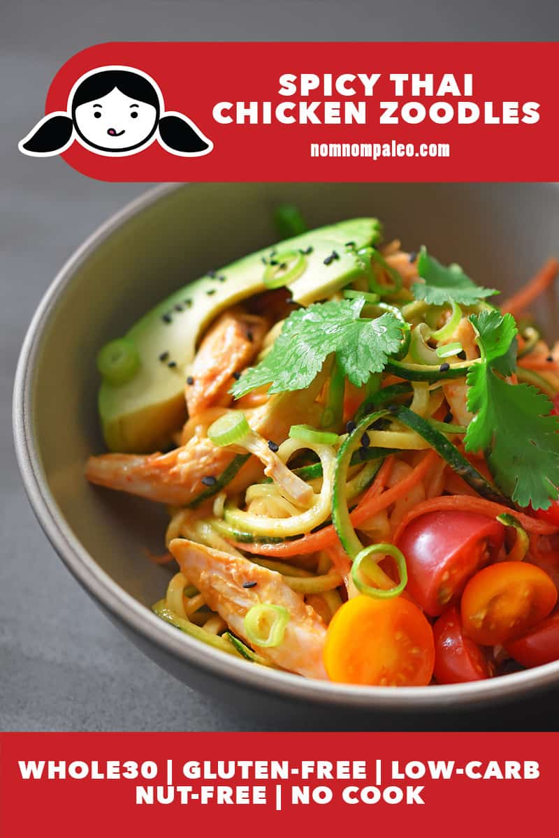 A bowl filled with Spicy Thai Chicken Zoodle Salad with cherry tomatoes and avocado. The red label says that the dish is Whole30, gluten free, nut free, no cook, and low carb.