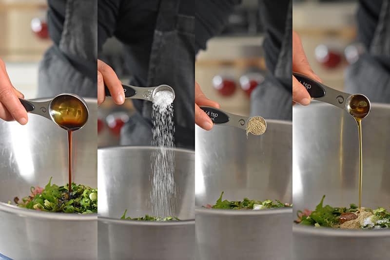 Adding the measured seasoning to the bowl of Wonton Meatball ingredients