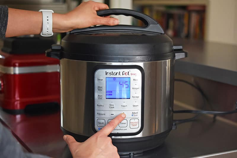 Programming the Instant Pot to cook for 45 minutes under high pressure