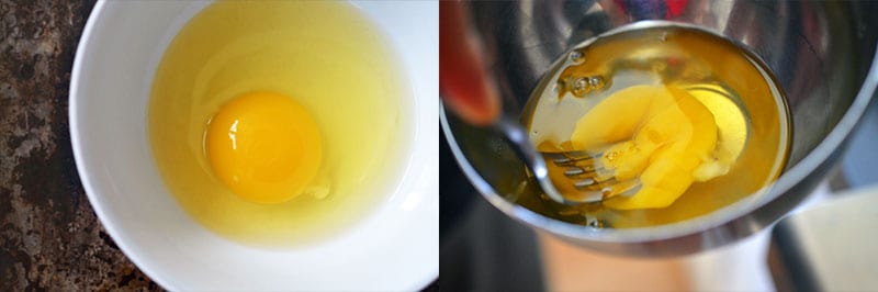 Popping the yolk with a fork in a metal bowl to make the filling for a paleo sausage egg muffin