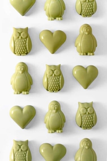 heart and owl-shaped Matcha Coconut Gummies on a white background