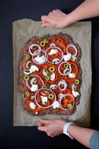 An overhead shot of Nom Nom Paleo's Meatza fresh from the oven.