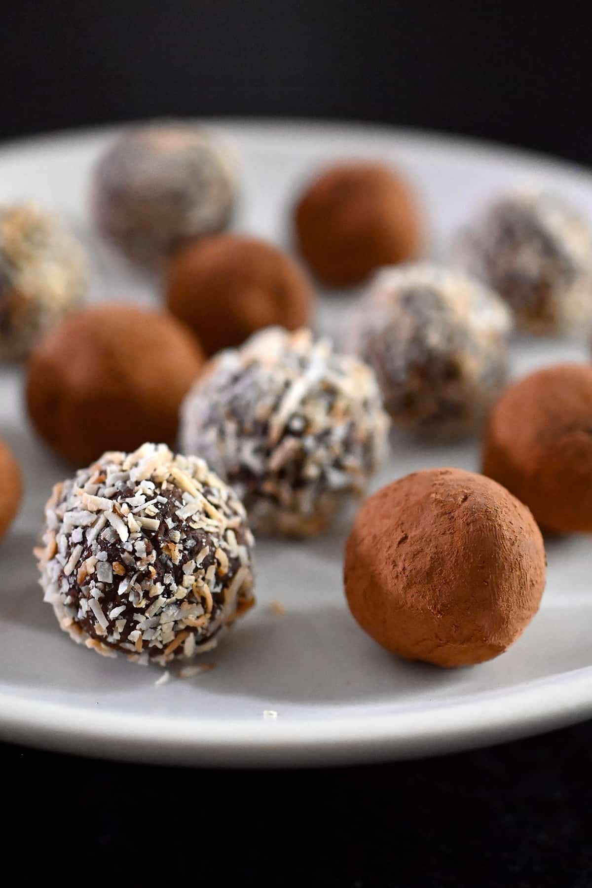 A closeup shot of vegan and paleo chocolate truffles by Nom Nom Paleo
