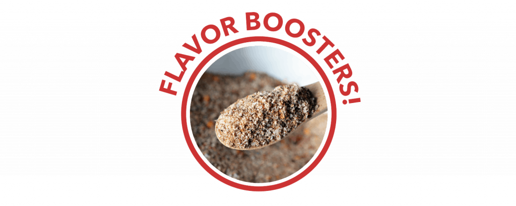 A red circle labelled "Flavor Boosters!" on top. Inside the circle, there is a spoon full of Nom Nom Paleo's Magic Mushroom Powder.