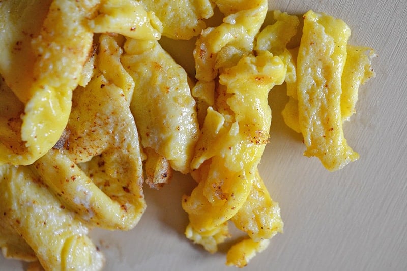 Scrambled egg pieces for Asian Cauliflower Fried Rice.