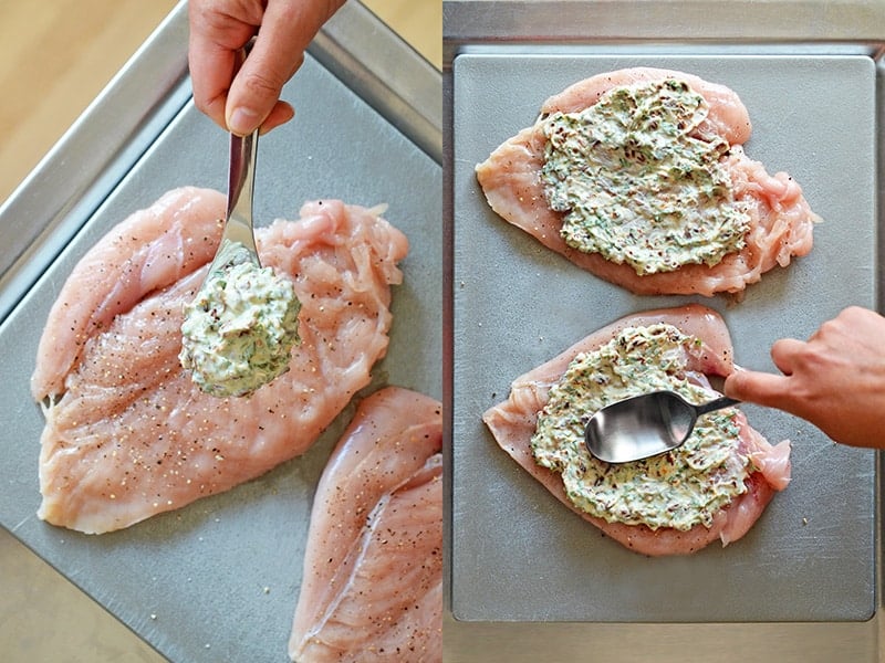 The seasoned mayonnaise is spread on one side of the flattened chicken breasts
