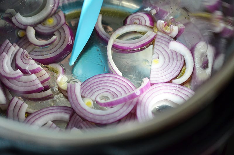 The onions are cooked in the Instant Pot on the Sauté function