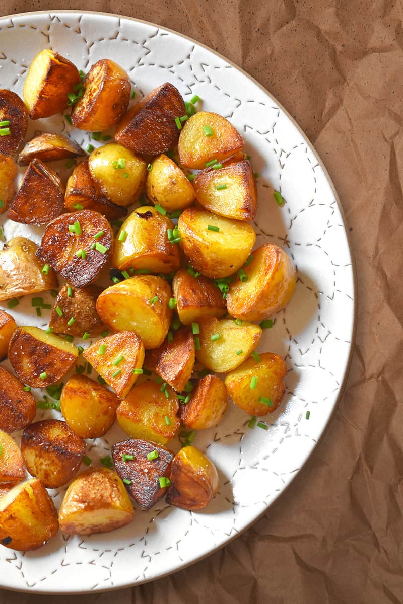 An overhead shot of a platter topped with Instant Pot (Pressure Cooker) Crispy Potatoes
