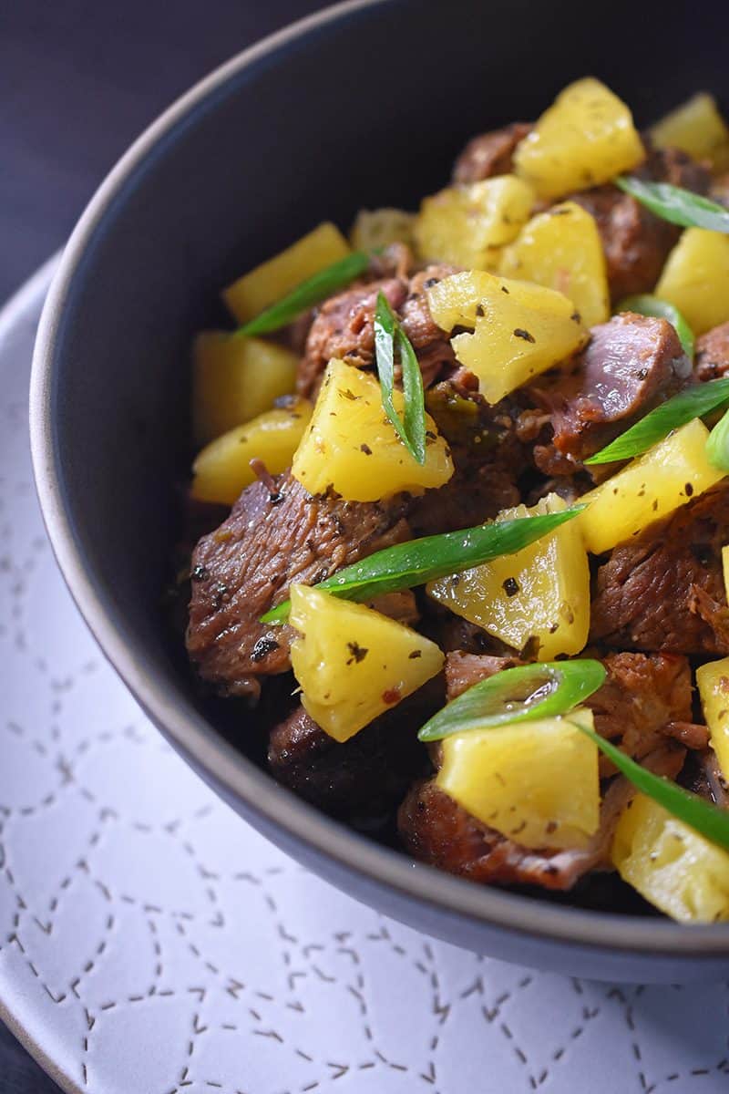 A close up of Instant Pot Spicy Pineapple Pork in a bowl.