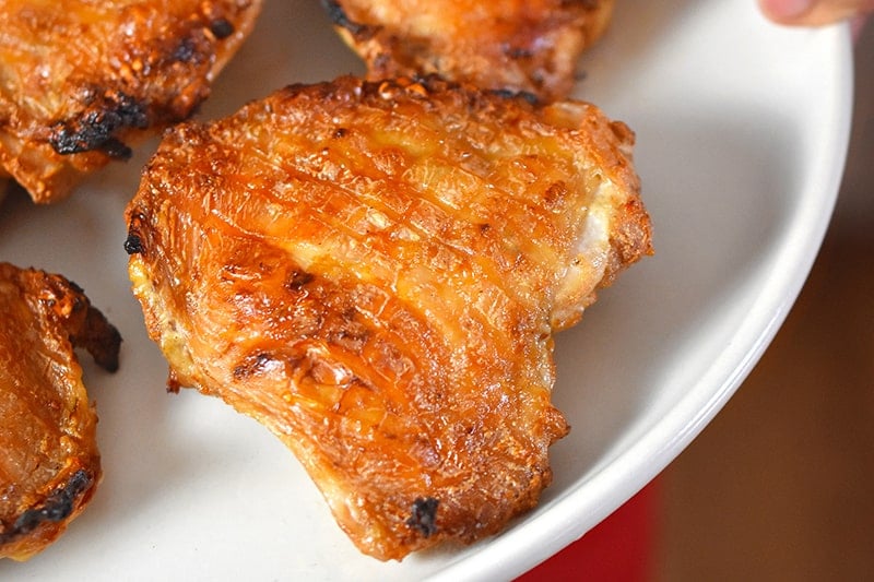 A close up shot of Umami Roast Chicken on a platter.