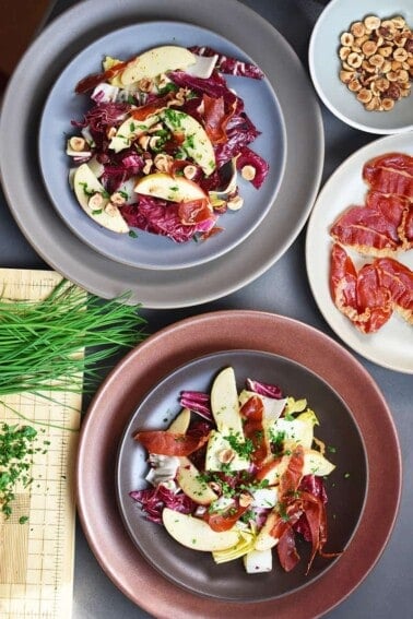 Endive, Radicchio, and Apple Salad with Porkitos and Hazelnuts by Michelle Tam https://nomnompaleo.com