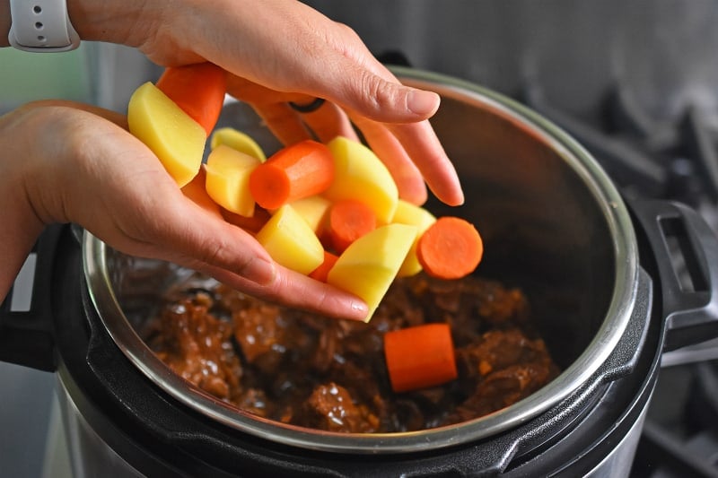 Adding cubed carrots and potatoes to Instant Pot Beef Stew 