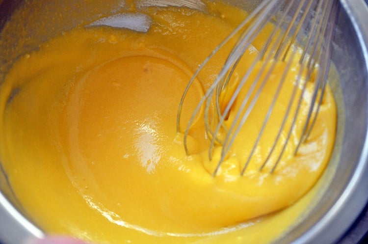 A closeup of the low carb Egg Foo Young batter mixed with a whisk until smooth.