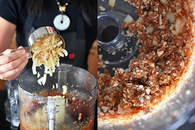 Someone adding toasted coconut flakes to a food processor with date paste to make healthy energy balls.