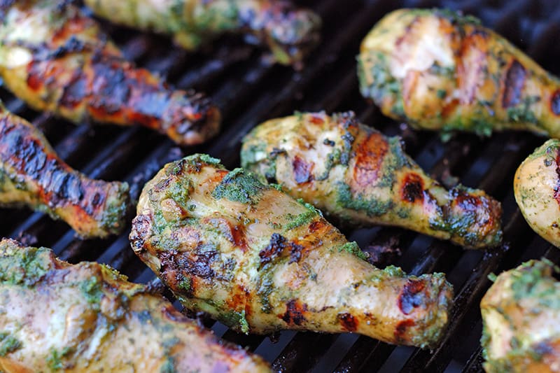 My Sister’s Phenomenal Grilled Green Chicken cooked on the grill.