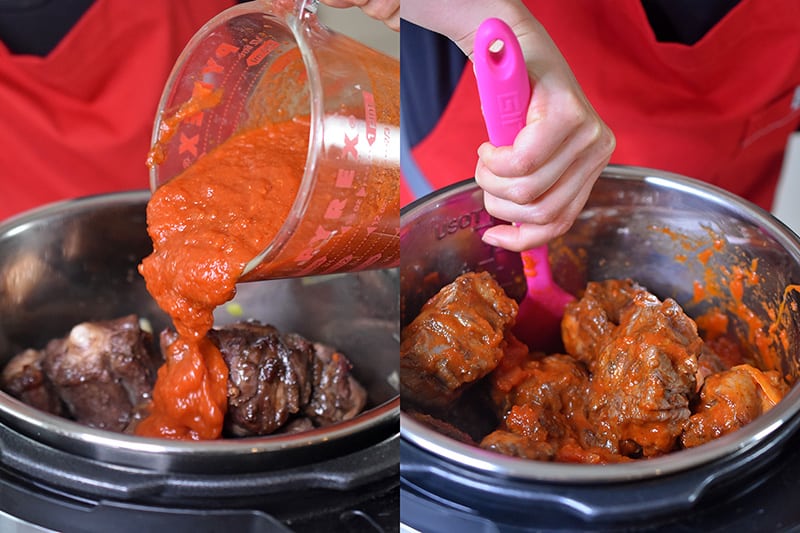 Marinara is poured into the Instant Pot and mixed in with the oxtails.
