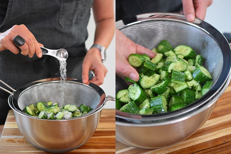 Putting the chopped cucumbers into the colander or mesh strainer and pour more salt over the top.