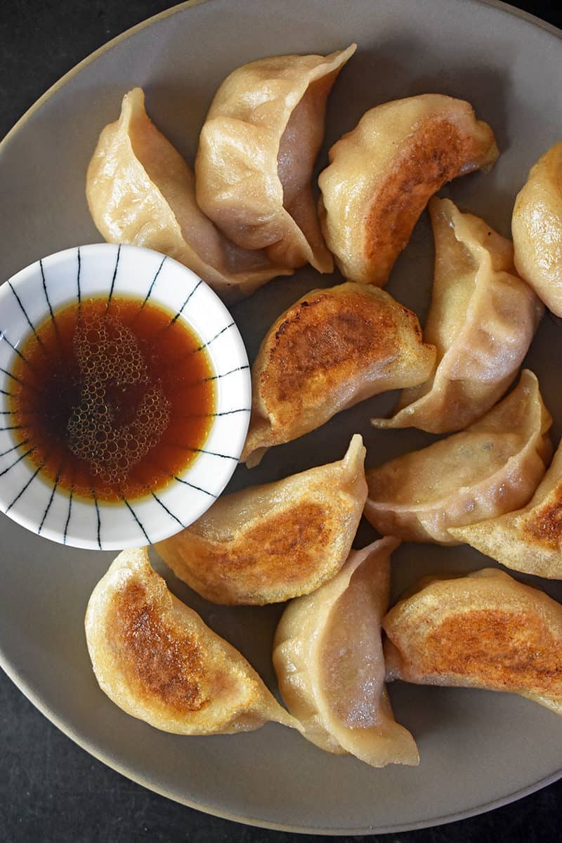 An overhead shot of Paleo Potstickers and dipping sauce