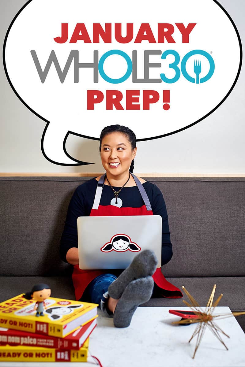 A woman sitting on a couch with a computer on her lap and a word bubble that says, "January Whole30 Prep!"
