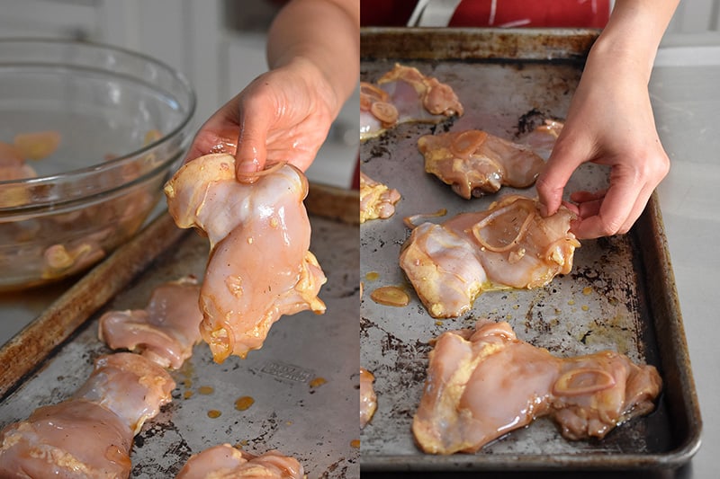 Place the chicken thighs on a rimmed baking sheet in a single layer.