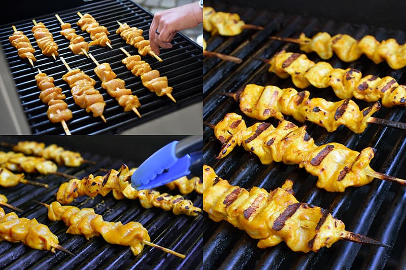 Grilling the chicken satay on a gas grill. The final chicken satay has brown grill marks on it.