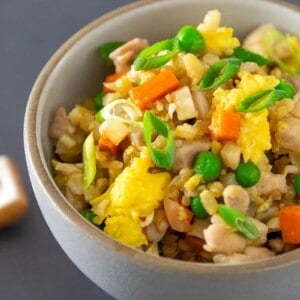 Close up shot of Cauliflower Chicken Fried Rice, a Whole30-friendly and healthy one-pan dinner.
