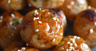 A platter of Whole30 and Paleo-friendly tsukune, Japanese ground chicken meatballs.