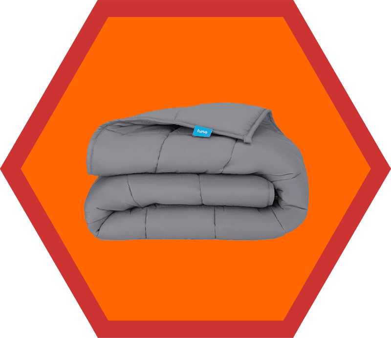 A gray colored folded Luna weighted blanket, an item on Nom Nom Paleo's 2019 holiday gift guide.