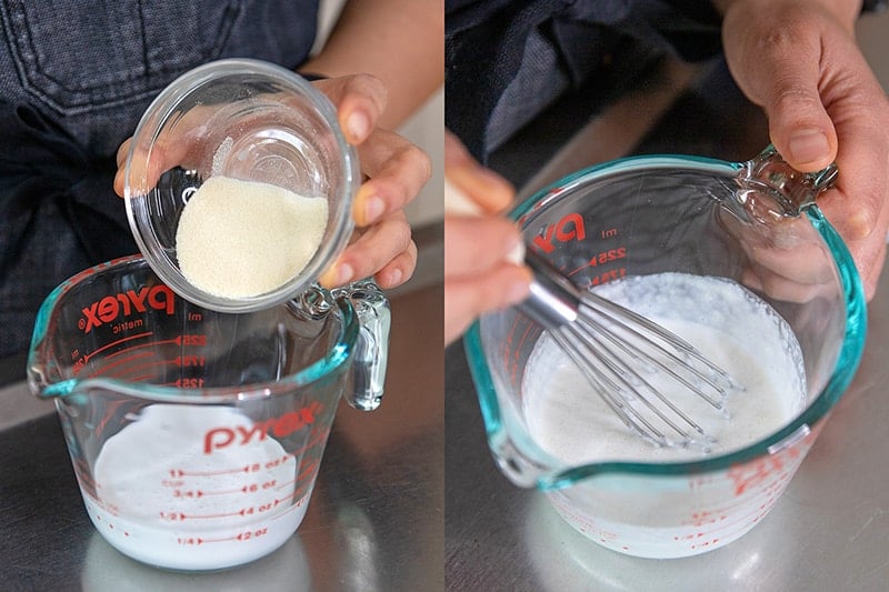 Adding gelatin to a measuring cup filled with coconut milk and then whisking it.