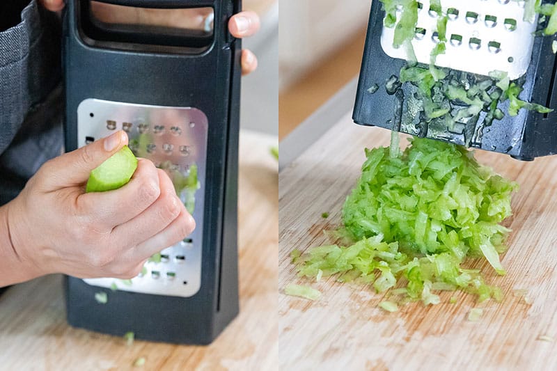 Grating the peeled and seeded cucumber on the large holes on a box grater. 