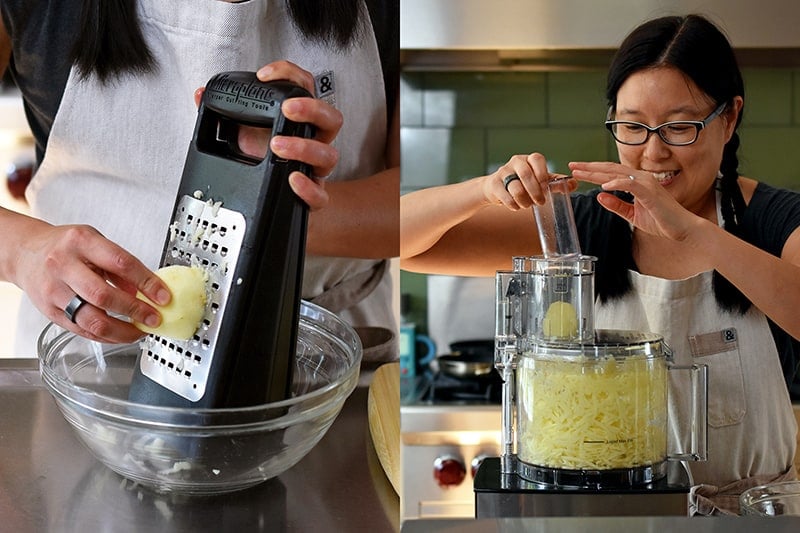 An Asian woman grating apples on the large holes of a grater and in a food processor.