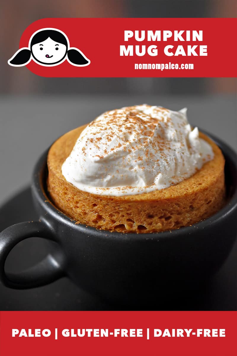 A paleo and gluten-free pumpkin mug cake topped with coconut cream in a black coffee mug. The red banner says it is paleo, gluten free, and dairy free.