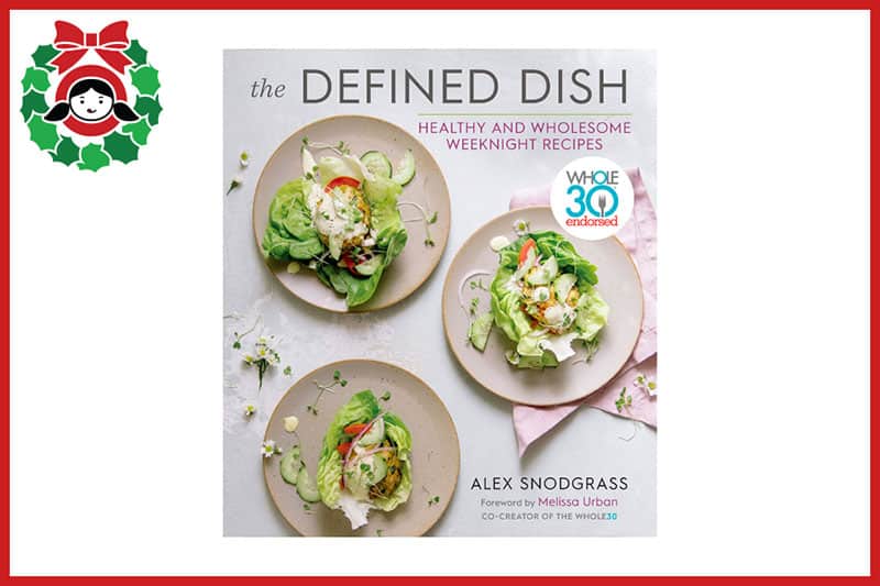 The cover of Alex Snodgrass's cookbook The Defined Dish, an item on the 2020 Holiday Gift Guide from Nom Nom Paleo