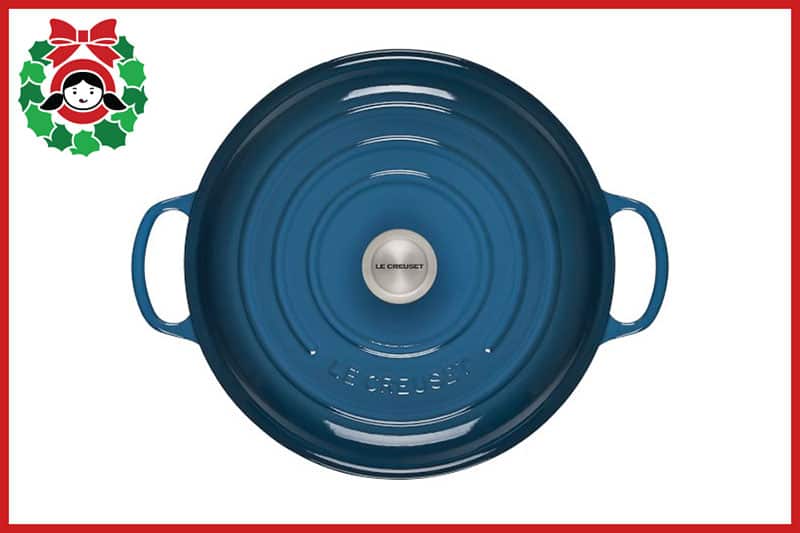 An overhead view of a blue Le Creuset Signature braiser, an item on the Nom Nom Paleo 2020 holiday gift guide.
