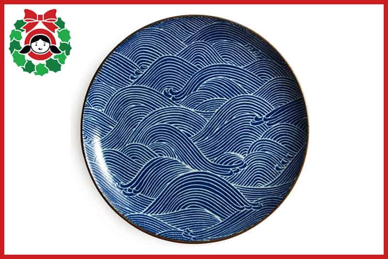 A top view of a dinner plate that has brown waves on it, an item on the 2020 Holiday Gift Guide from Nom Nom Paleo