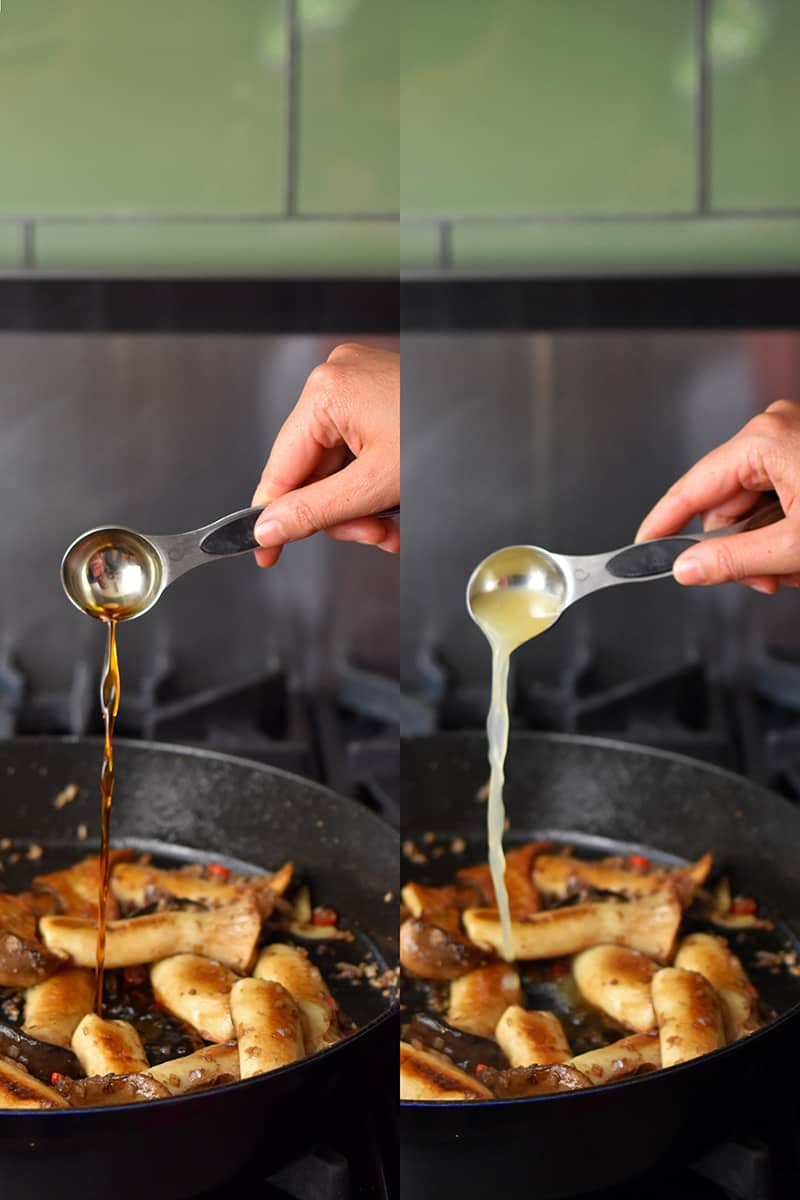 Two shots side by side showing a hand adding a spoonful of fish sauce and a spoonful of lime juice to a cast iron skillet filled with king oyster mushrooms