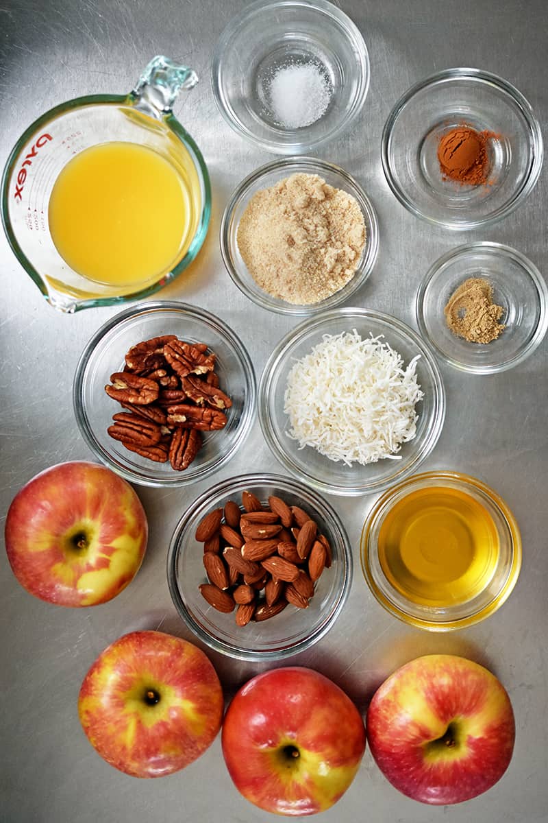An overhead shot of the raw ingredients needed for baked apples