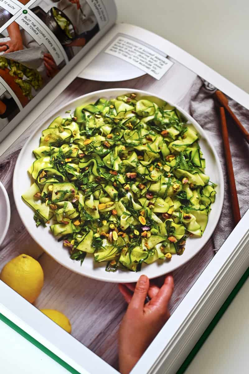 A page from Nom Nom Paleo: Let's Go! showing a picture of Zucchini Carpaccio Salad