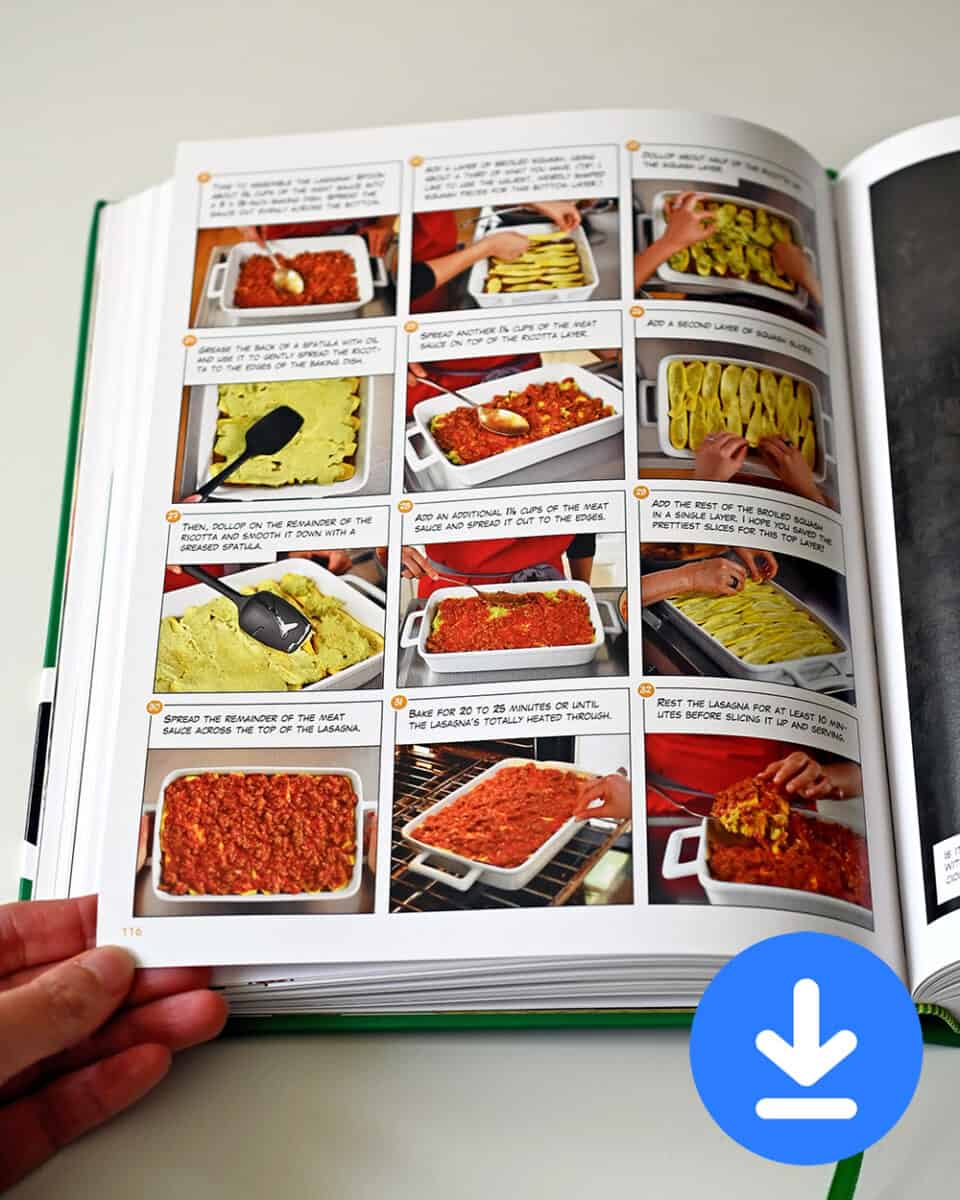 A copy of Nom Nom Paleo: Let's Go! opened to display step-by-step photos of lasagna