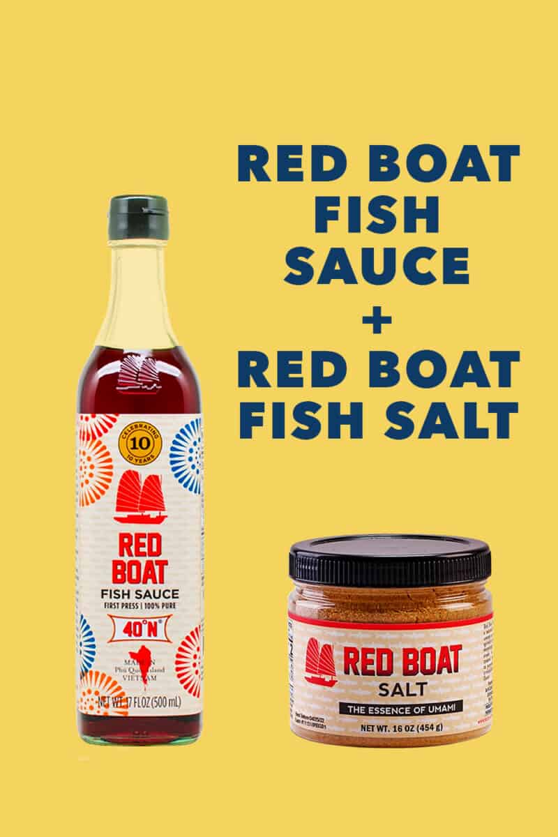 Red Boat fish sauce and Red Boat fish salt on a yellow background.