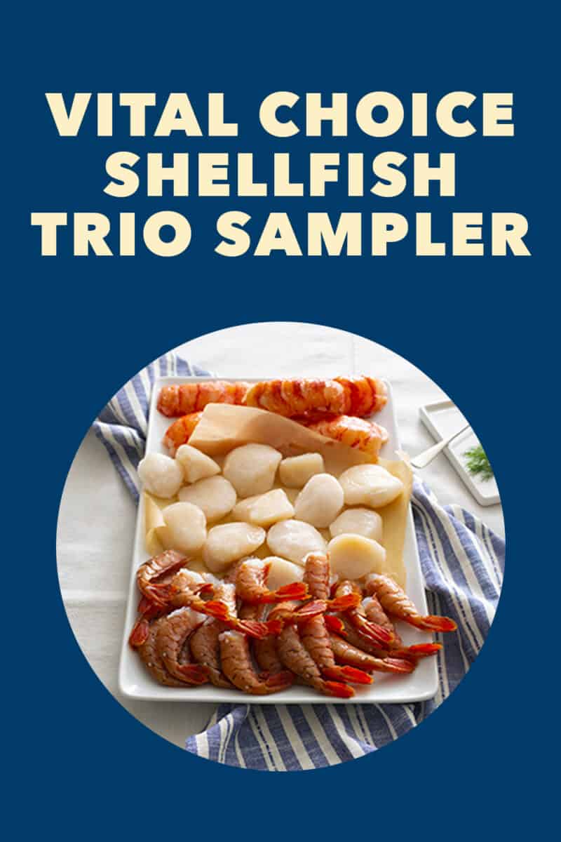 A circle with a platter of raw shrimp, scallops, and lobster tails. The background color is dark blue.
